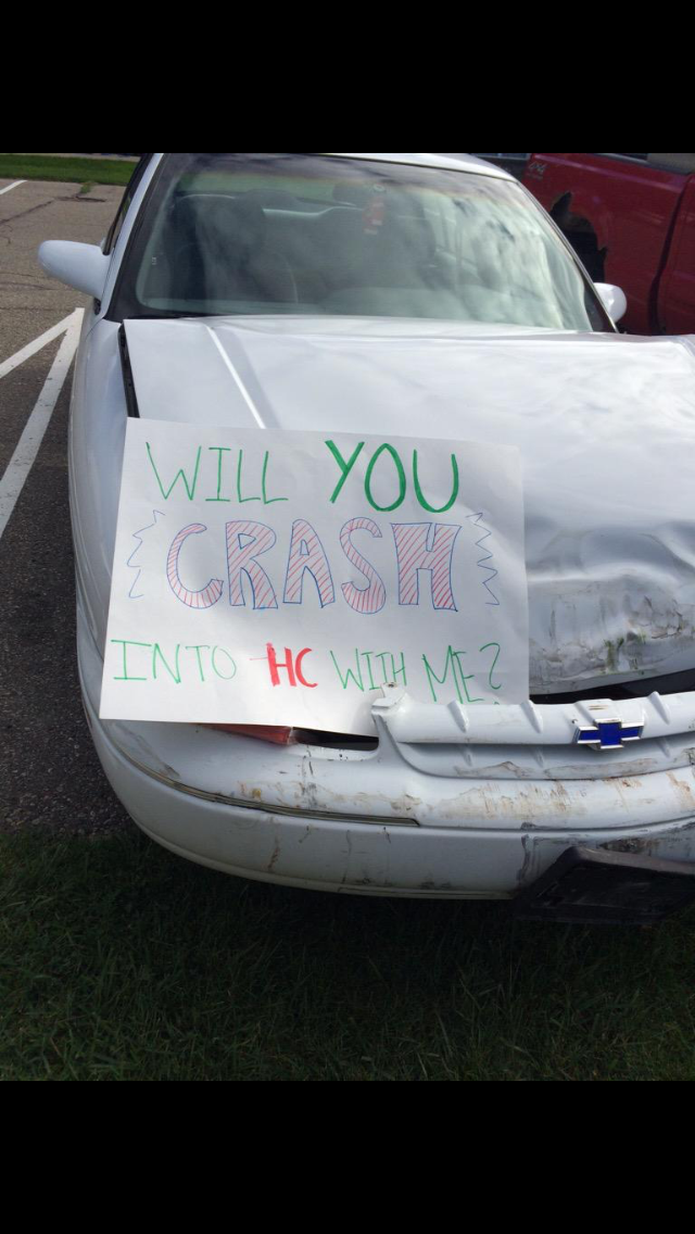 Senior Charlie Petersen, asks junior girlfriend, Taylor Smith in a smashing manner. 