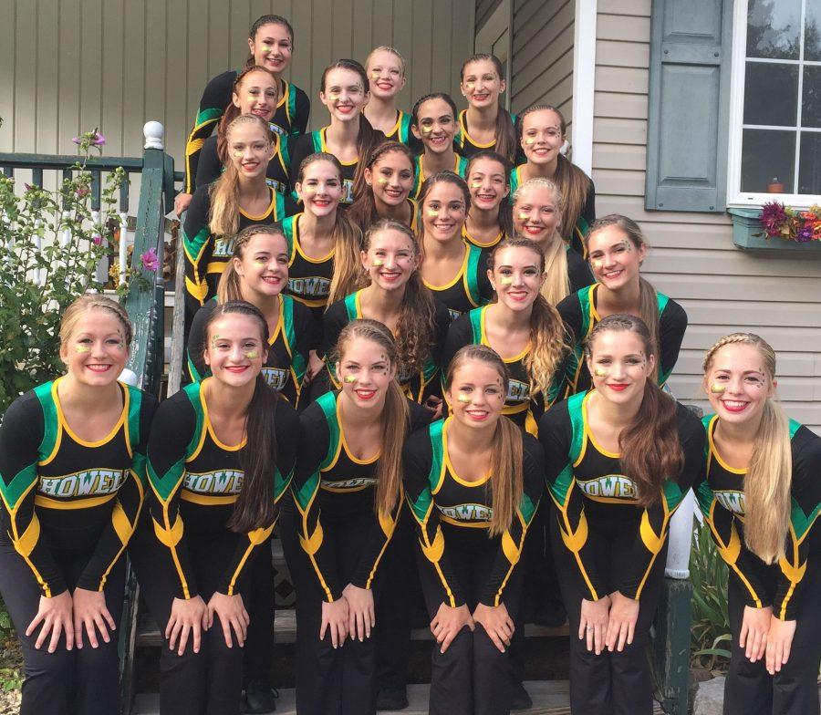 HHS Pom performs with Hartland
