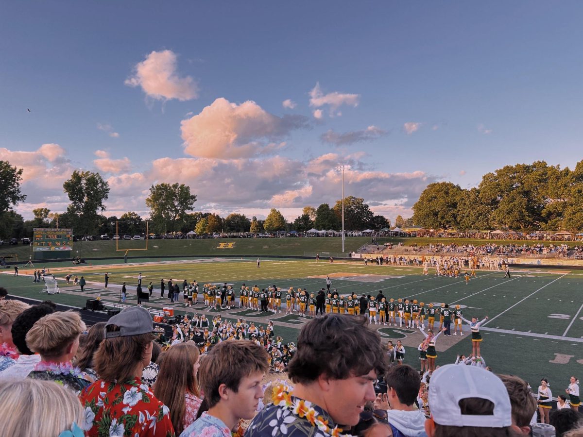 Behind the lights: Howell High's pom, cheer and band fuel Friday night spirit